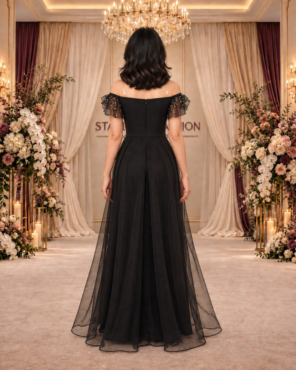 Midnight Jewel black evening gown from the back, showing the zipper and sheer sleeves