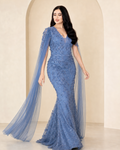 Sky blue embroidered dress with a cape